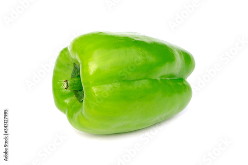 Green sweet pepper isolated on a white background. Raw organic vegetable