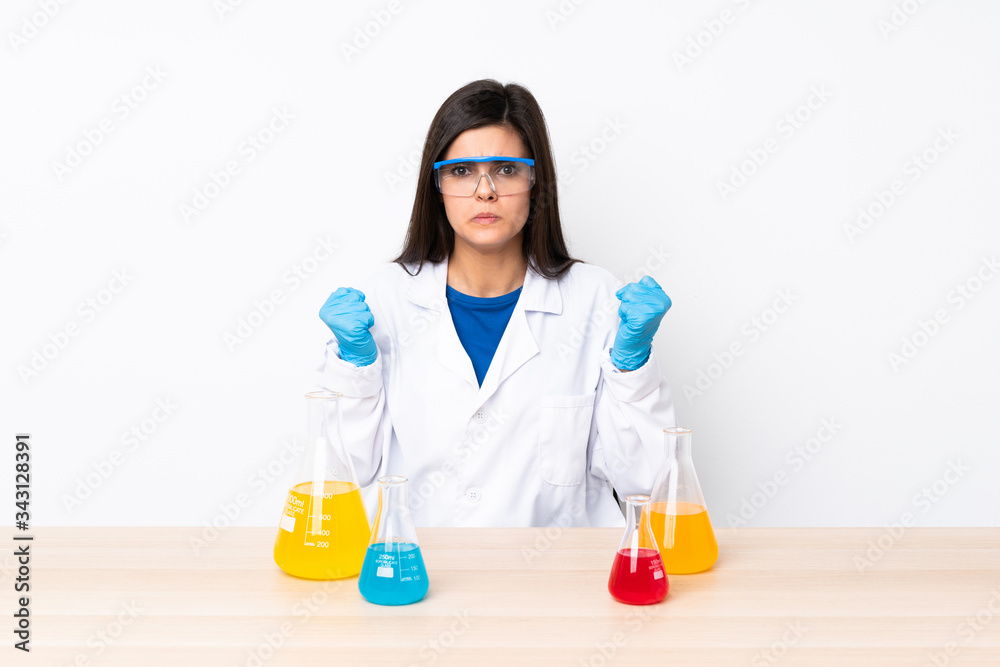 Young scientific woman in a table with angry gesture Young scientific woman in a table with angry gesture