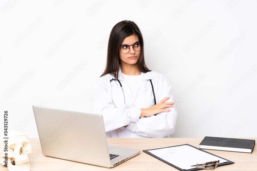 Professional traumatologist in workplace thinking an idea Professional traumatologist in workplace thinking an idea