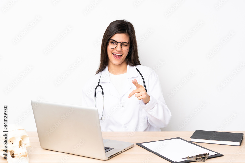Professional traumatologist in workplace points finger at you Professional traumatologist in workplace points finger at you
