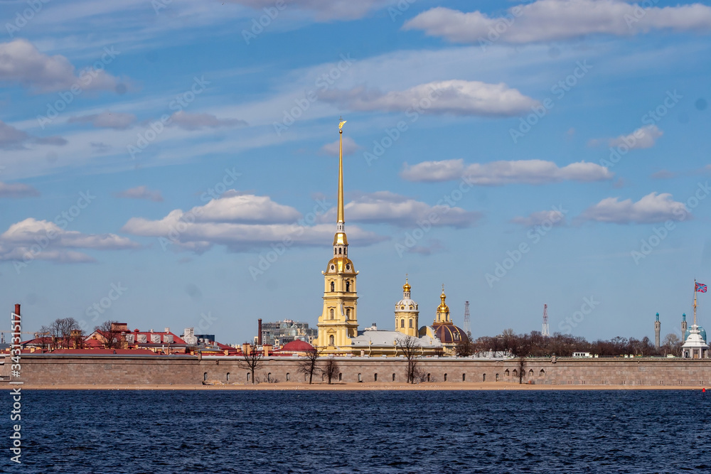 Peter and Paul fortress in Saint Petersburg in a sunny day, taken from the opposite bank