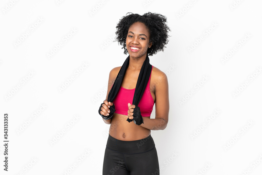 Young African American woman isolated on white background with sport towel