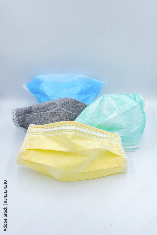 Group of medical mask isolated on white background, Corona protection, Medical mask isolated. Face mask protection against pollution, virus, flu and Covid-19. Health care and surgical concept. Group of medical mask isolated on white background, Corona protection, Medical mask isolated. Face mask protection against pollution, virus, flu and Covid-19. Health care and surgical concept.