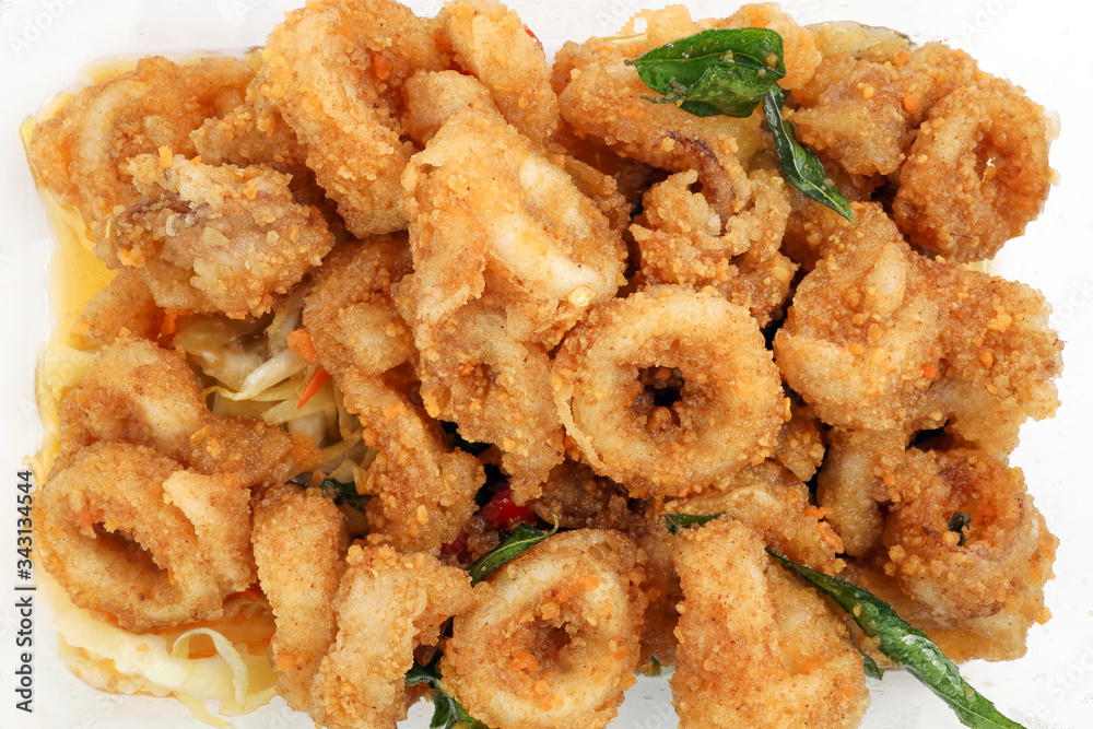 Thai style salted squid calamari fried with salted egg batter Thai style salted squid calamari fried with salted egg batter