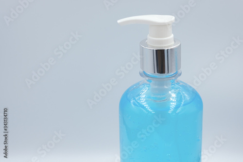 lcohol gel and sanitizer hand gel cleaners for anti Bacteria and virus on White Background, People using alcohol gel to wash hands to prevent COVID-19 virus.  COVID-19 protection. photo