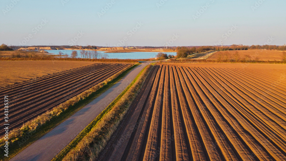 Golden hour time with the view of a farmers fields. Golden hour time with the view of a farmers fields.