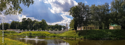 Uglich Kremlin. view of the historic building of the city Council and The Church of the Kazan icon of the mother of God from the Stone stream photo