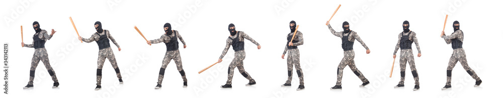 Soldier with baseball bat isolated on white Soldier with baseball bat isolated on white