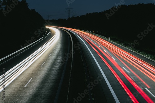 Long exposure of highway through forest