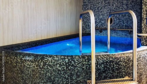 Photography Medicinal Thermal Baths hot tub spa by swimming pool Budapest, Hungary