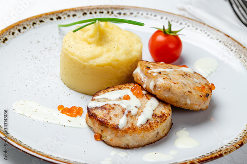 cutlets of pike with mashed potatoes and red caviar