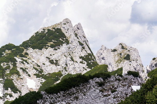 Strichkogel mountain summit between Grosser Donnerkogel and Angerstein in Alps, Gosau, Gmunden district, Upper Austria federal state, sunny summer day, clear blue sky photo