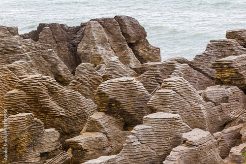 Bizarre rocks of Paparoa national park. Pancake Rocks.  South Island, New Zealand photo
