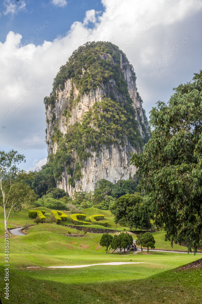 Fototapeta premium Golf range with mountain landscape background at Malaysia Kuala Lumpur Selangor.