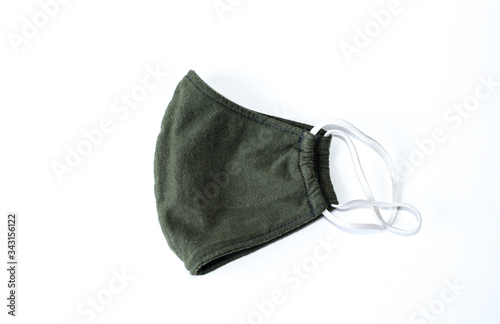 A black cloth mask in a white scene