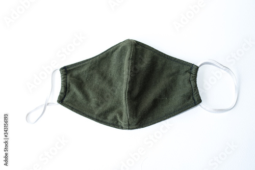 A black cloth mask in a white scene