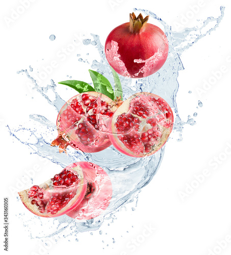 pomegranates in water splash isolated on a white background