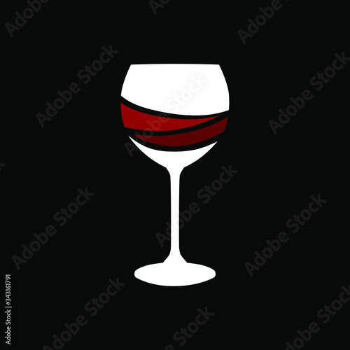 Abstract red wine glass on black backdrop. Design element