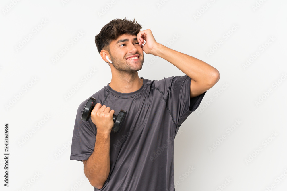 Sport man over isolated white wall has realized something and intending the solution Sport man over isolated white wall has realized something and intending the solution