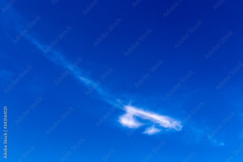 Beautiful blue sky with Cirrus Cumulus clouds. Panorama of the clear blue sky for your design. Sky background in Sunny weather. Beautiful blue sky with Cirrus Cumulus clouds. Panorama of the clear blue sky for your design. Sky background in Sunny weather.