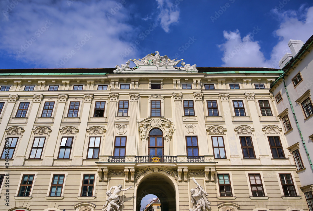 Obraz premium Vienna, Austria - May 19, 2019 - The Hofburg Palace is a complex of palaces from the Habsburg dynasty located in Vienna, Austria.