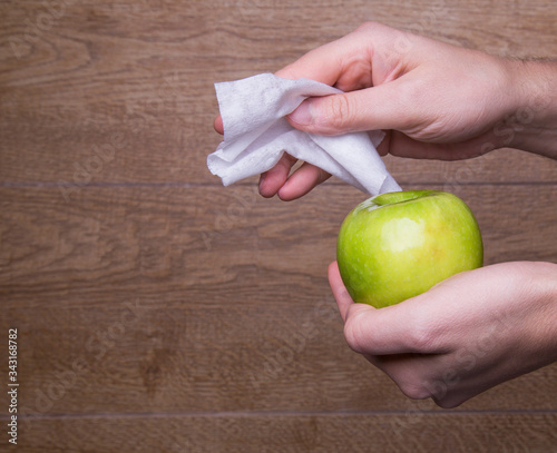 washing and cleaning the Apple with antiseptic products before use