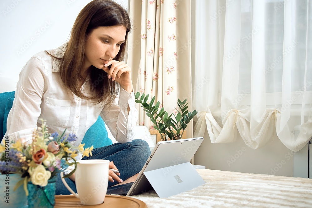 Work from home. Woman runs business from home. Remote work on the internet Work from home. Woman runs business from home. Remote work on the internet