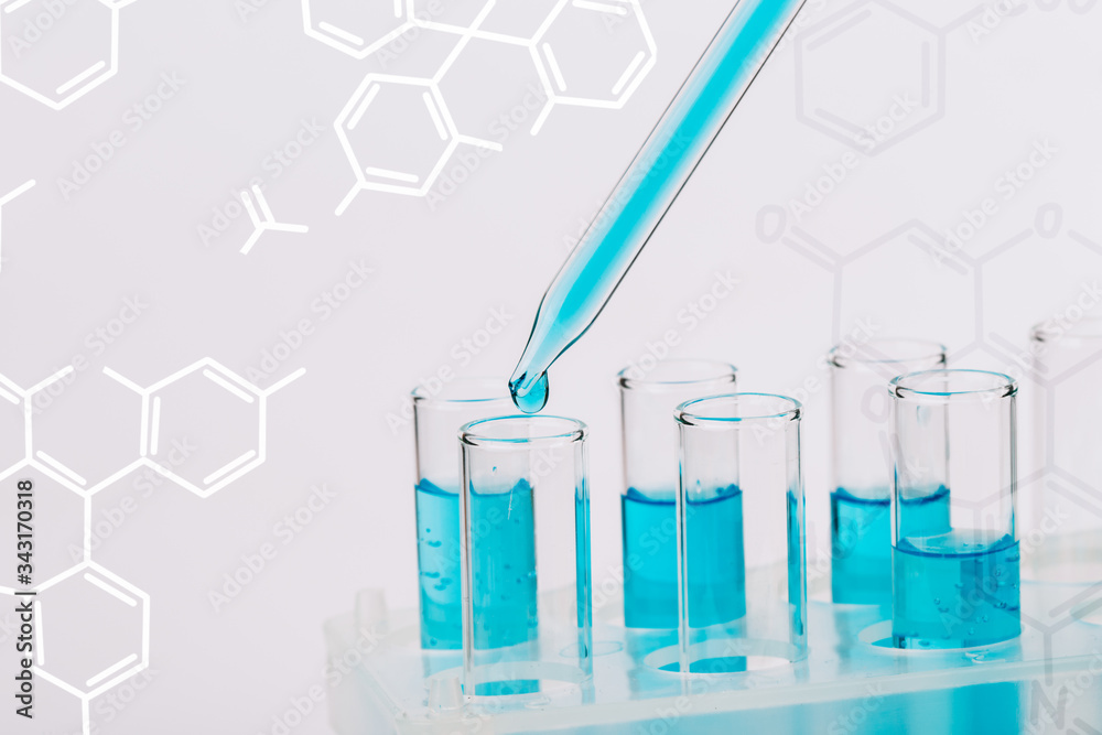 A pipette that adds fluid to one of several tubes. Lab tests A pipette that adds fluid to one of several tubes. Lab tests