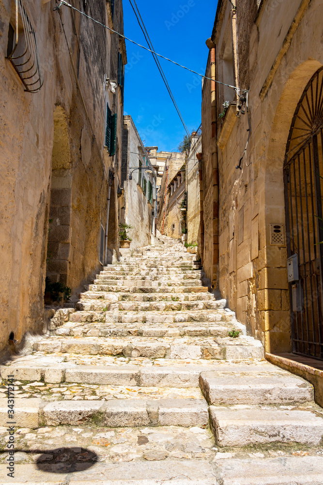Narrow stairway street in the old town of Matera, Province of Matera, Basilicata Region, Italy