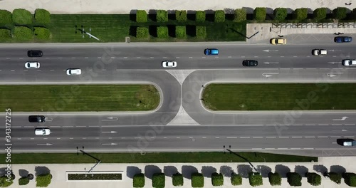 Top down aerial city view of freeway busy city road traffic jam highway.