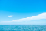 Beautiful Ocean and blue sky wih white cloud background.