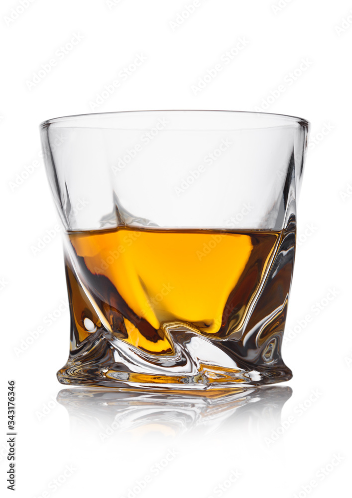 Scotch whiskey in crystal modern luxury glass on white background. Scotch whiskey in crystal modern luxury glass on white background.