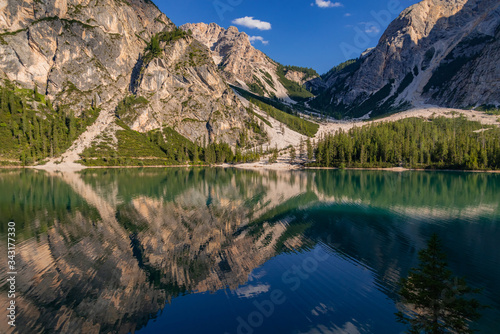 Braies Lake or Pragser Wildsee in the Fanes-Sennes-Prags natural park. Mountain lake in the dolomites of South Tyrol or Sudtirol. A beautiful sunny day  a relaxing landscape with bright colors. Italy.
