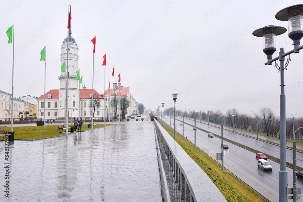 Fototapeta premium Mogilev, Belarus - March 2020. Beautiful old town in Mogilev city, Belarus. Town hall. Mogilev landmark, cultural heritage. City street with historical building.