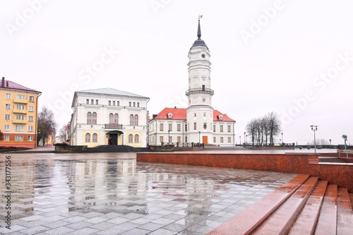 Mogilev, Belarus - March 2020. Beautiful old town in Mogilev city, Belarus. Town hall. Mogilev landmark, cultural heritage. City street with historical building.