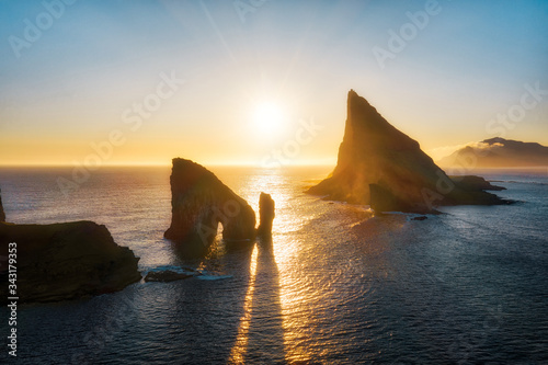 Drangarnir Rocks during Sunset in the Faroe Islands, Denmark photo