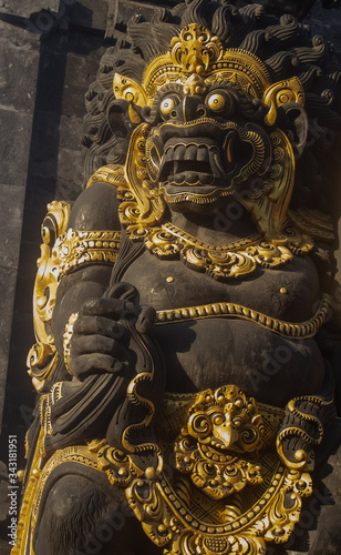 Black and gold guardian of the gate  Balinese statue