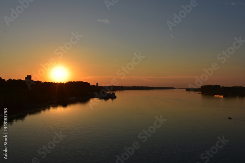 Sunset orange over the Danube River. Romantic atmosphere © anicafoto