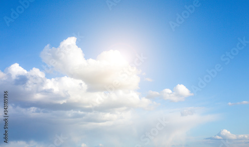 Blue sky and white clouds. Beautiful nature background. Summer vibes. Soft focus wallpaper.
