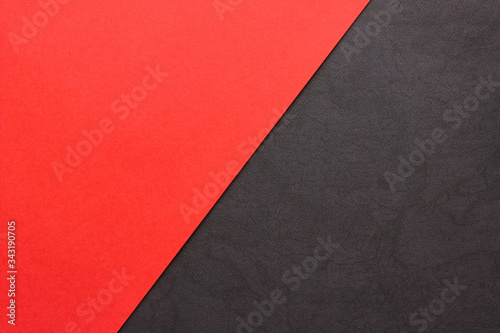 Red and textured black paper background. Abstract banner  poster with place for text. Minimalism
