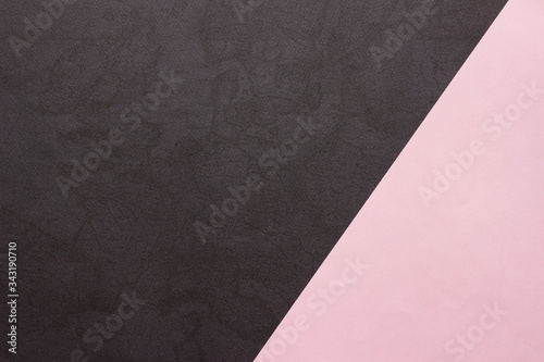 Pink and textured black paper background. Abstract banner  poster with place for text. Minimalism