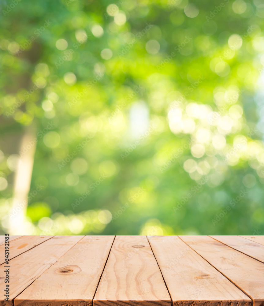 Real wood table top texture on blur leaf tree garden background.For create  product display or design key visual foto de Stock | Adobe Stock