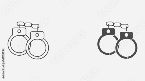 Handcuffs outline and filled vector icon sign symbol
