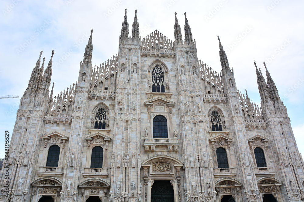Milan Cathedral of Santa Maria Nascente, famous Duomo di Milano at Piazza del Duomo in Italy; main facade