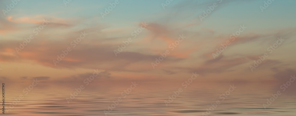Beautiful sea sunset with cirrus clouds. Natural composition