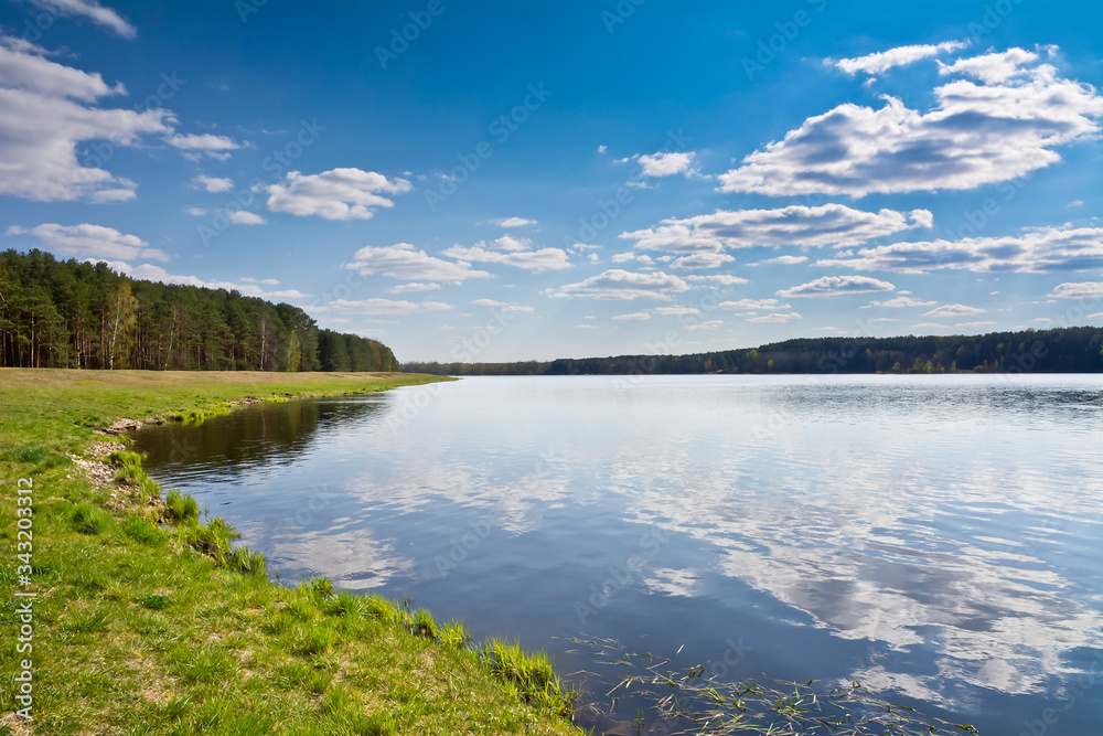 Fototapeta premium Summer landscape with lake and blue sky