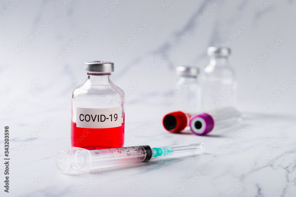 Vaccine and syringe injection. It use for prevention,immunization and treatment from corona virus infection(novel coronavirus disease 2019,COVID-19,nCoV 2019 from Wuhan). Medicine infectious concept. Vaccine and syringe injection. It use for prevention,immunization and treatment from corona virus infection(novel coronavirus disease 2019,COVID-19,nCoV 2019 from Wuhan). Medicine infectious concept.