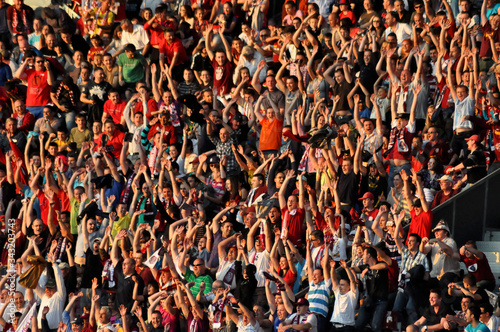 Leinwand Poster Full Frame Shot Of Spectators Cheering At Stadium