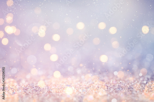 Christmas and New Year holidays background  glitter vintage lights background. defocused.