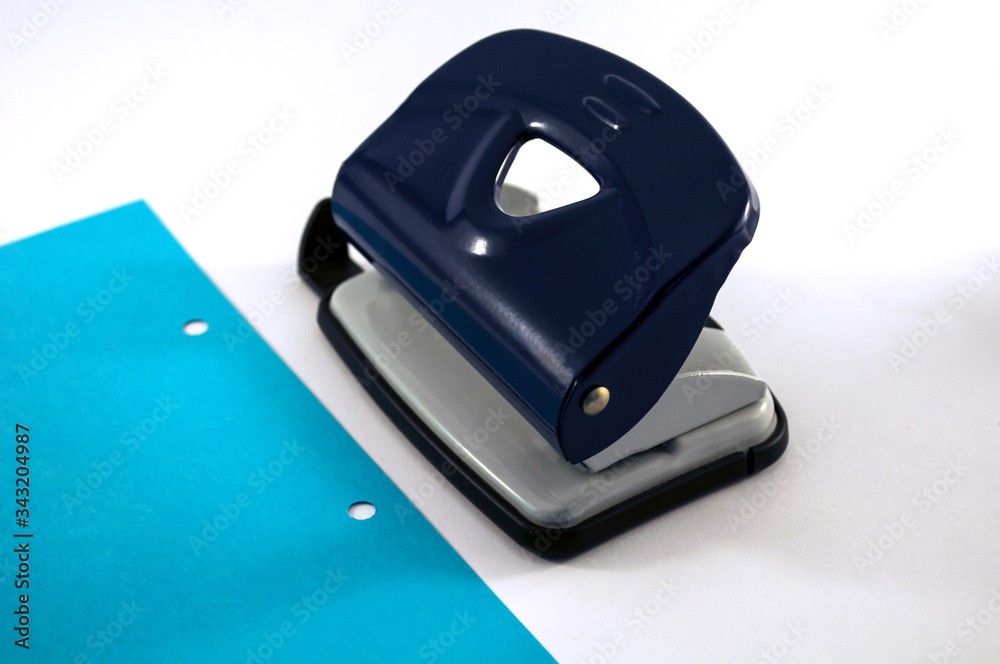 office, punch, blue paper with punch holes office, punch, blue paper with punch holes